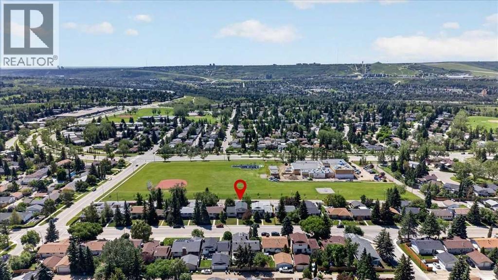 7327 Silver Springs Road NW, Calgary, Alberta  T3B 3X1 - Photo 1 - A2327082