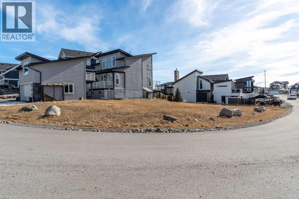 423 Cottageclub Cove, Rural Rocky View County, Alberta  T4C 1B1 - Photo 7 - A2327289