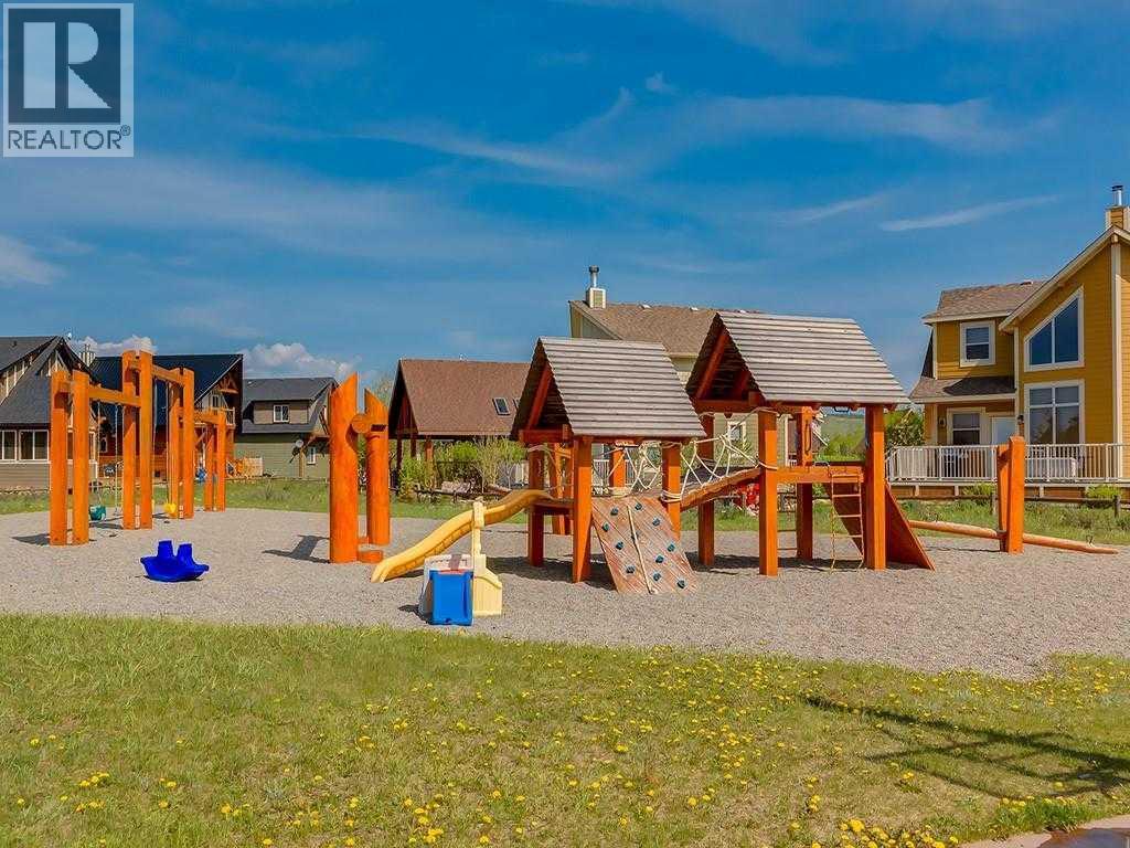 423 Cottageclub Cove, Rural Rocky View County, Alberta  T4C 1B1 - Photo 35 - A2327289