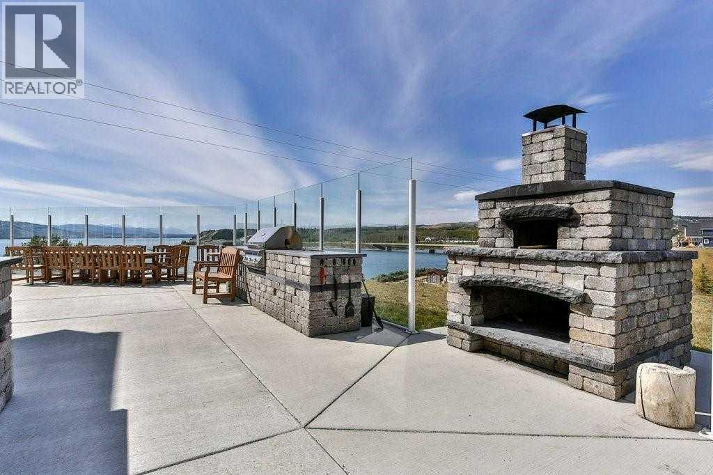 423 Cottageclub Cove, Rural Rocky View County, Alberta  T4C 1B1 - Photo 32 - A2327289
