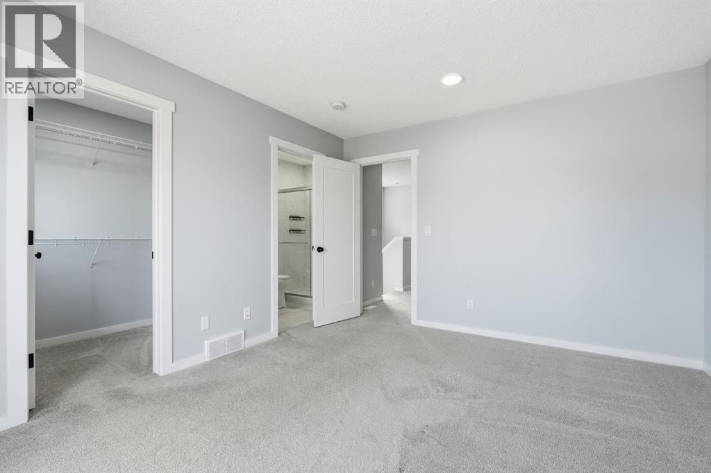 141 Belmont Drive SW, Calgary, Alberta  T2X 4Z7 - Photo 18 - A2330413