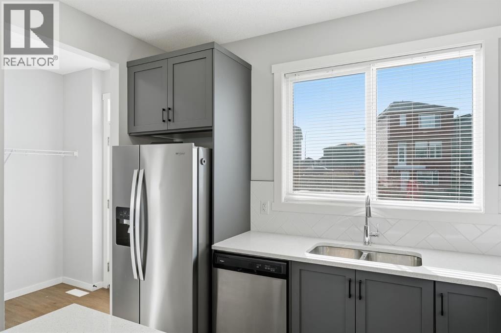 141 Belmont Drive SW, Calgary, Alberta  T2X 4Z7 - Photo 9 - A2330413
