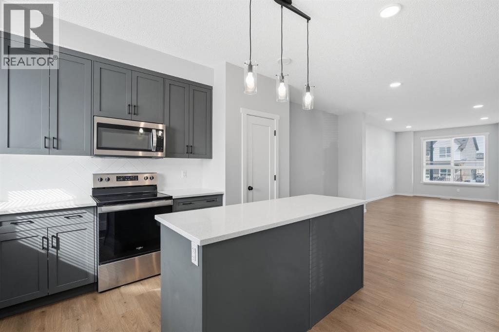 141 Belmont Drive SW, Calgary, Alberta  T2X 4Z7 - Photo 12 - A2330413