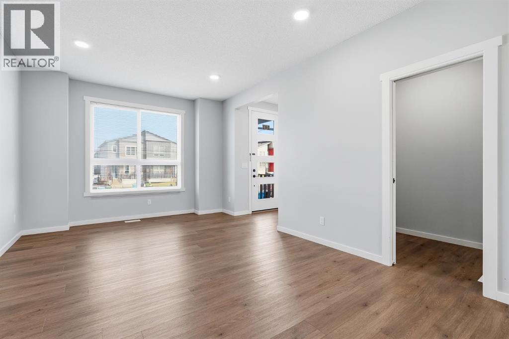 141 Belmont Drive SW, Calgary, Alberta  T2X 4Z7 - Photo 7 - A2330413