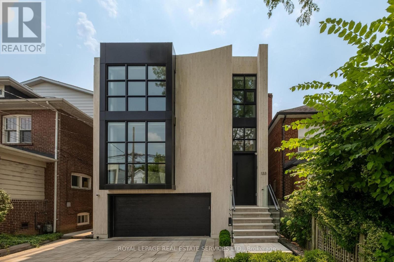 <div class="slider-price">$4,395,000</div><p>133 Deloraine Avenue, Toronto, Ontario</p>