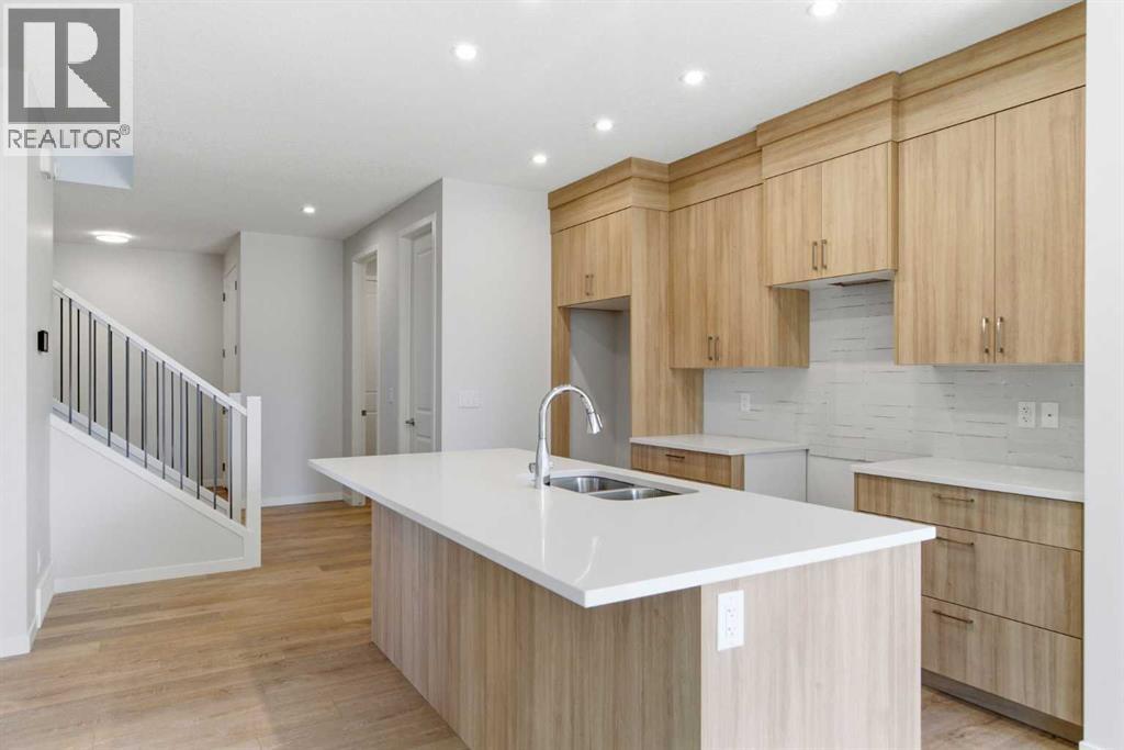 53 Snowberry Common SE, Calgary, Alberta  T3M 4H4 - Photo 5 - A2318953