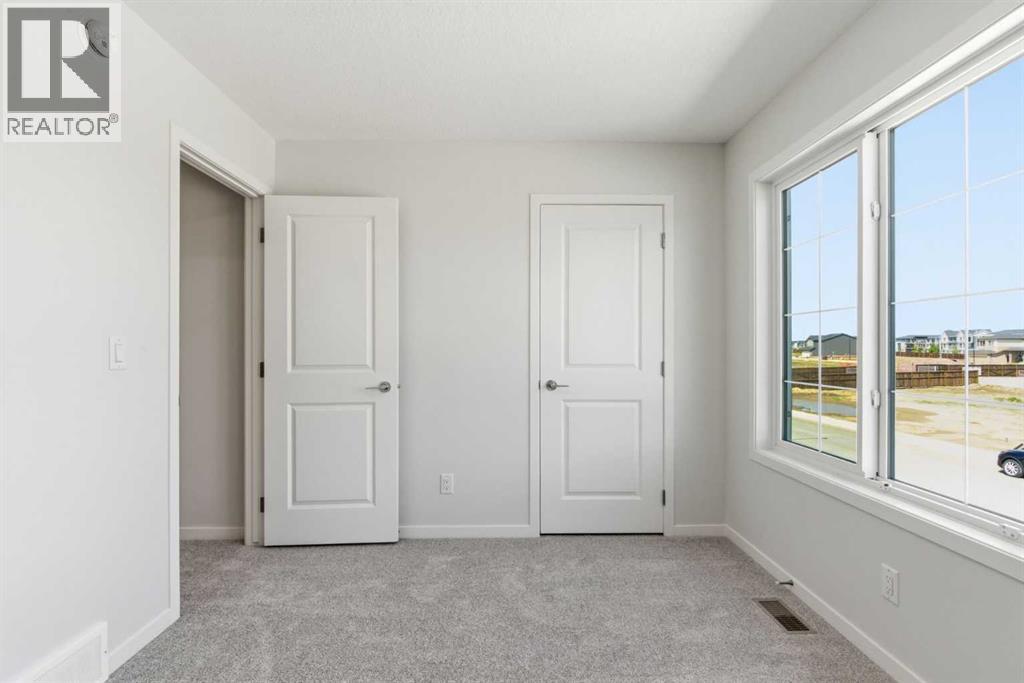 53 Snowberry Common SE, Calgary, Alberta  T3M 4H4 - Photo 38 - A2318953