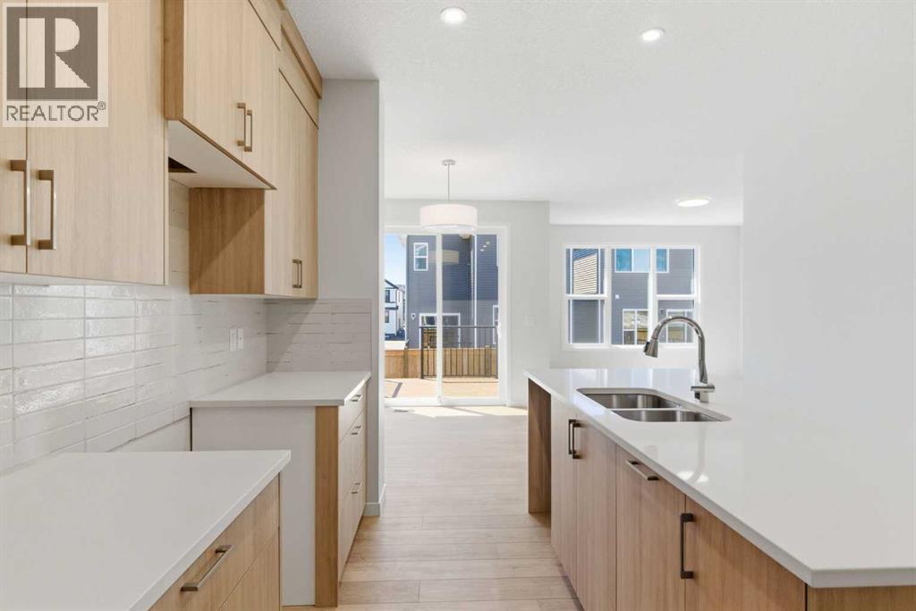 53 Snowberry Common SE, Calgary, Alberta  T3M 4H4 - Photo 7 - A2318953