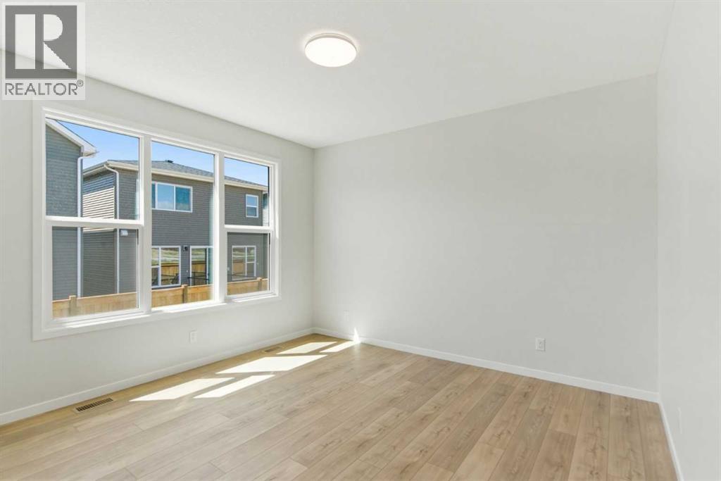 53 Snowberry Common SE, Calgary, Alberta  T3M 4H4 - Photo 9 - A2318953