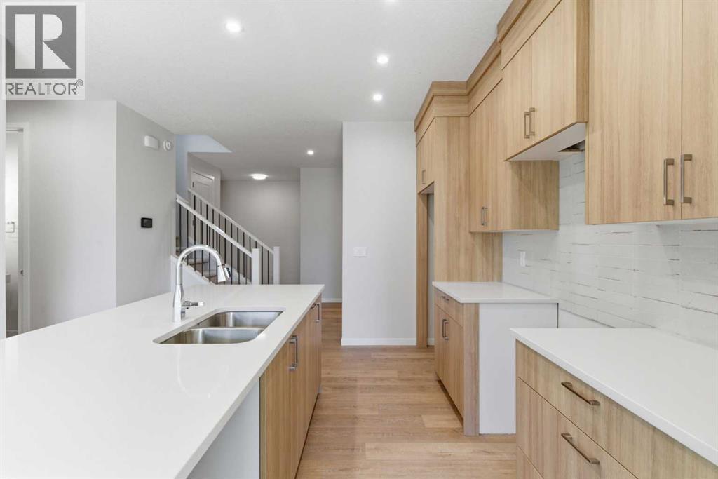53 Snowberry Common SE, Calgary, Alberta  T3M 4H4 - Photo 6 - A2318953
