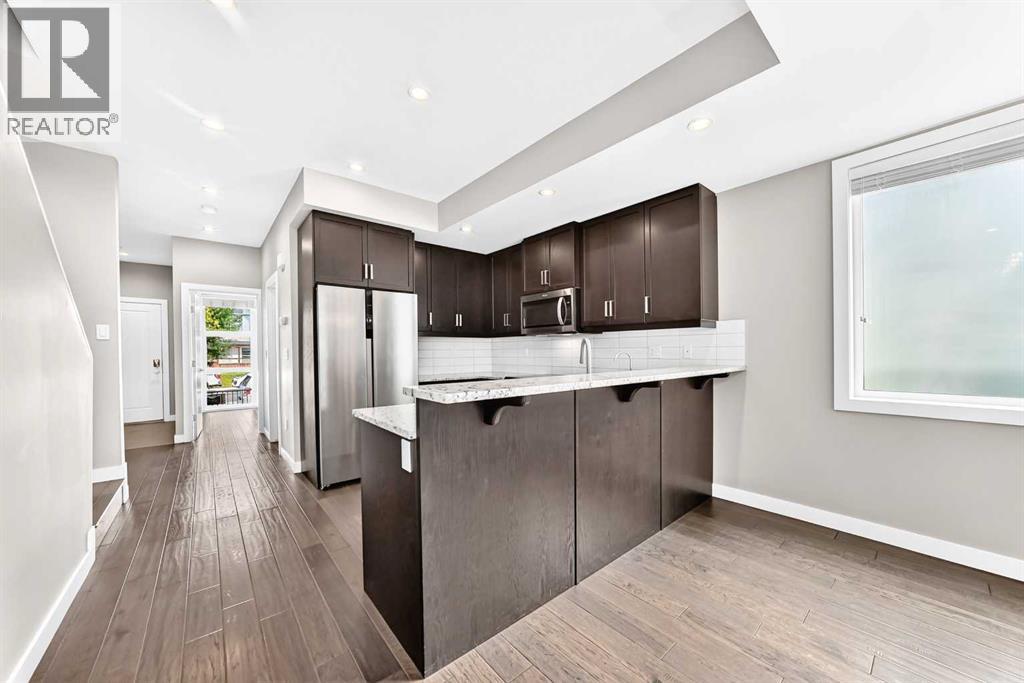 1317 20 Avenue NW, Calgary, Alberta  T3M 1G4 - Photo 3 - A2333331