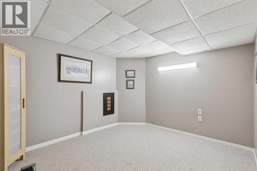 48 Westridge Drive, Okotoks, Alberta  T1S 1T2 - Photo 31 - A2309277
