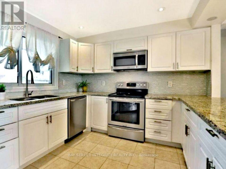 29 - 1580 Lancaster Drive, Oakville, Ontario  L6H 2Z5 - Photo 2 - W13634366