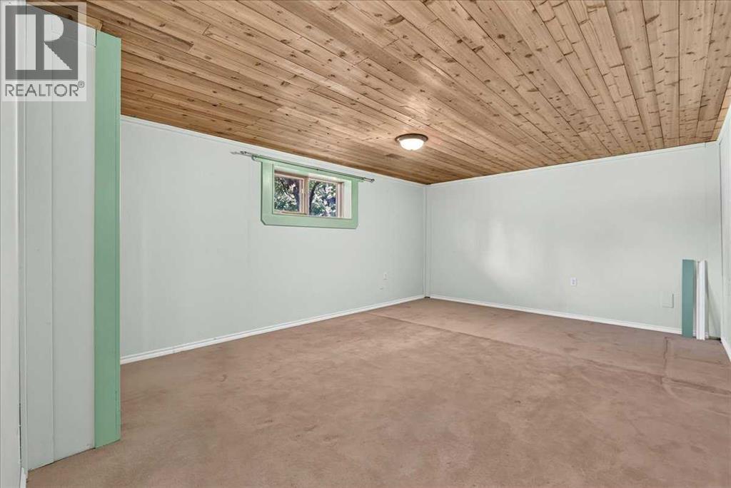7727 Bowcliffe Crescent NW, Calgary, Alberta  T3B 2S6 - Photo 35 - A2328949
