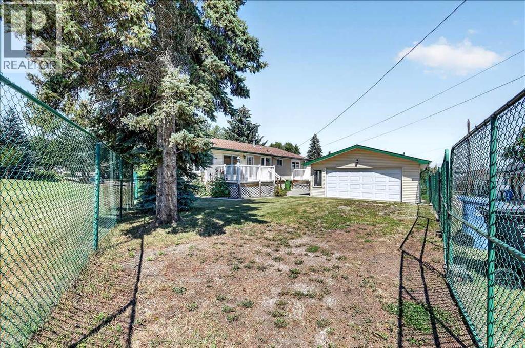 7727 Bowcliffe Crescent NW, Calgary, Alberta  T3B 2S6 - Photo 40 - A2328949