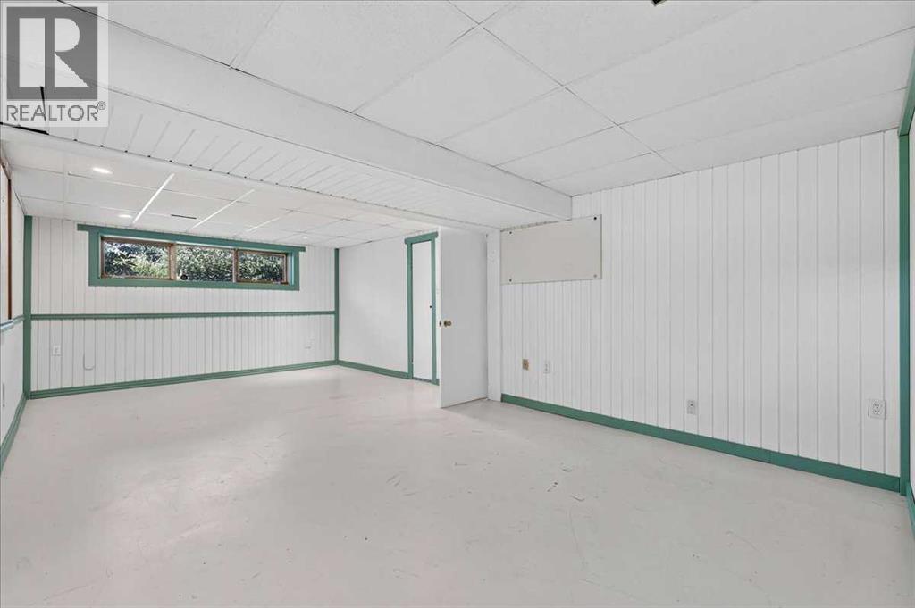 7727 Bowcliffe Crescent NW, Calgary, Alberta  T3B 2S6 - Photo 34 - A2328949
