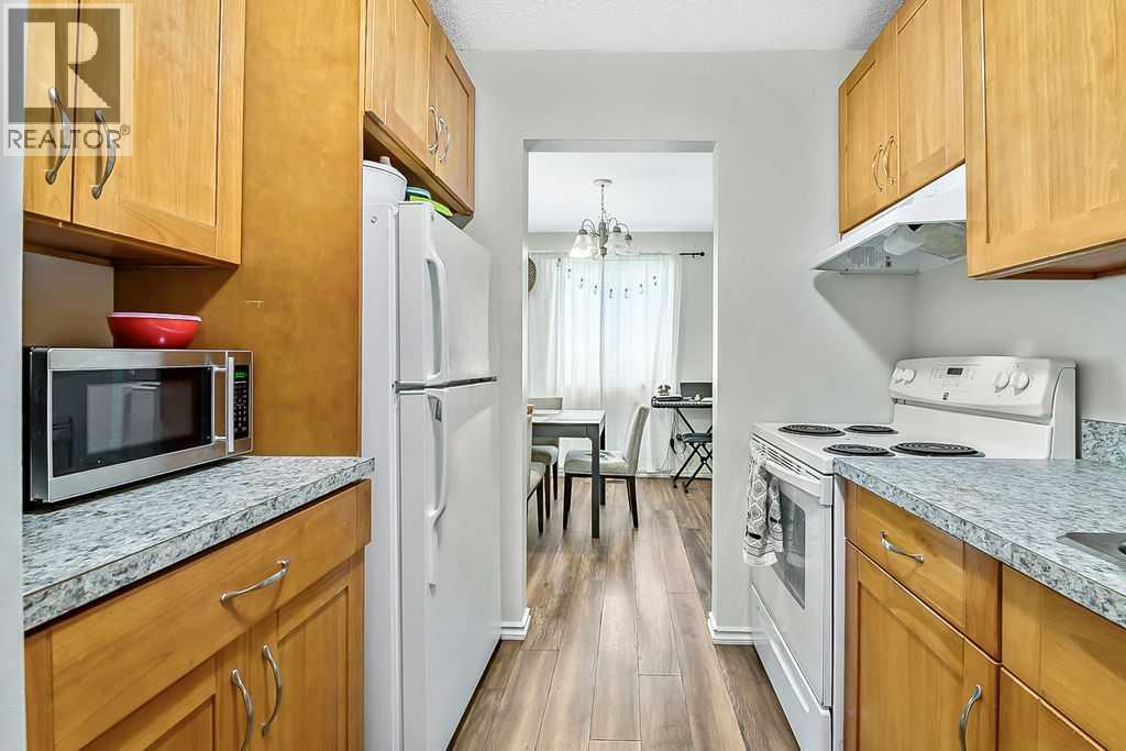 124 Bergen Road NW, Calgary, Alberta  T3K 1H9 - Photo 6 - A2328708