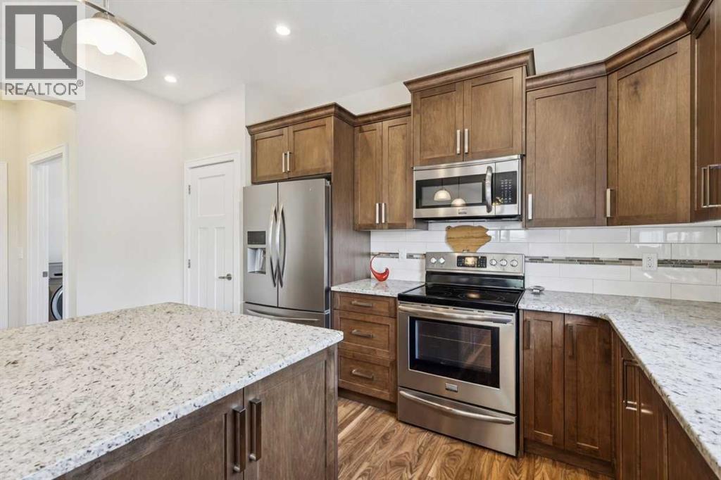 102 Cooperswood Place SW, Airdrie, Alberta  T4B 3T6 - Photo 4 - A2314965