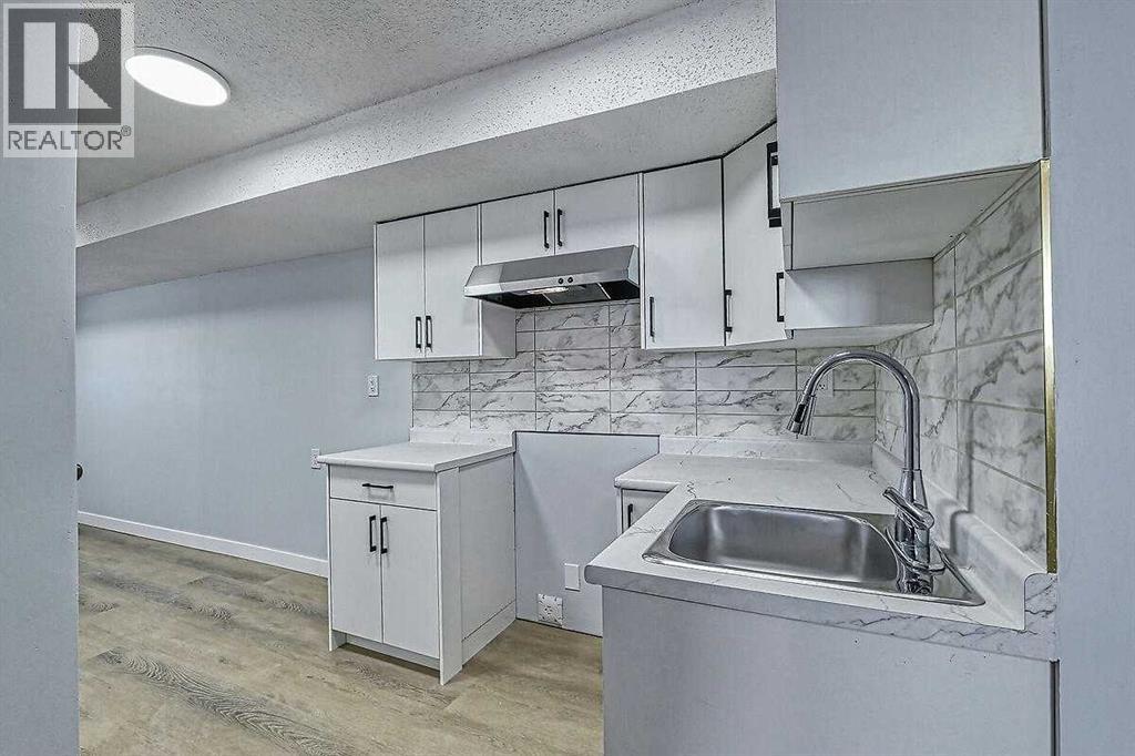 71 Falton Drive Ne, Calgary, Alberta  T3K 1K6 - Photo 35 - A2315489