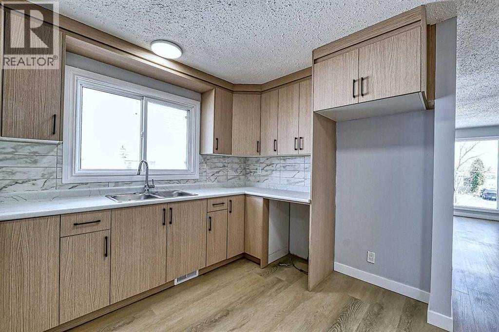 71 Falton Drive Ne, Calgary, Alberta  T3K 1K6 - Photo 15 - A2315489