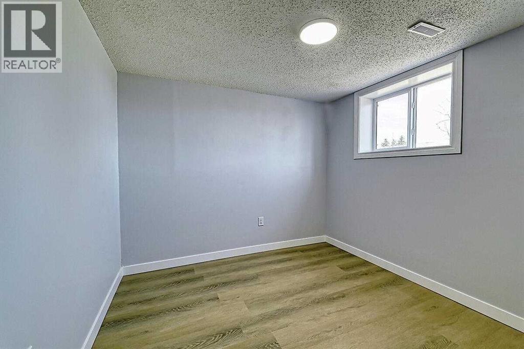 71 Falton Drive Ne, Calgary, Alberta  T3K 1K6 - Photo 42 - A2315489