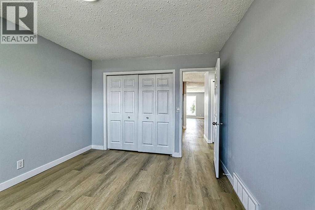 71 Falton Drive Ne, Calgary, Alberta  T3K 1K6 - Photo 22 - A2315489
