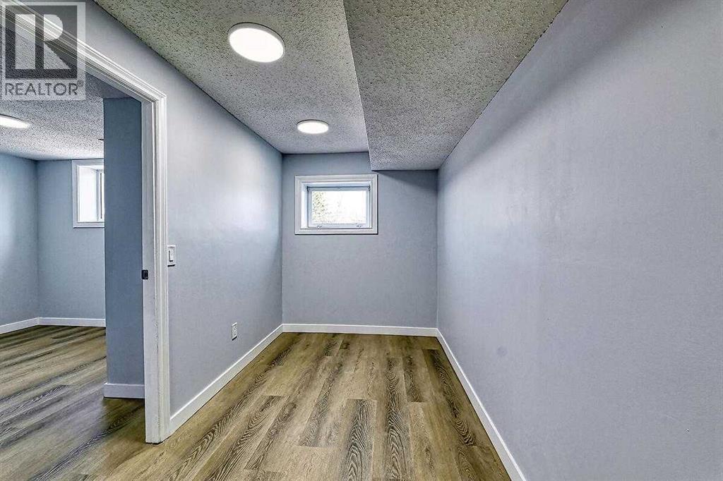 71 Falton Drive Ne, Calgary, Alberta  T3K 1K6 - Photo 41 - A2315489