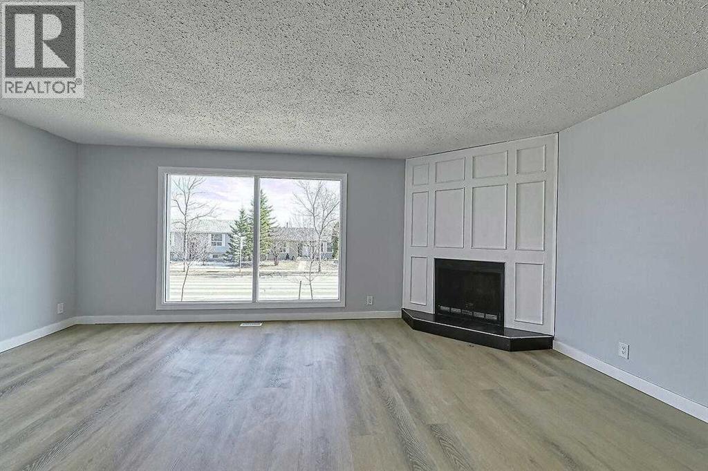71 Falton Drive Ne, Calgary, Alberta  T3K 1K6 - Photo 7 - A2315489