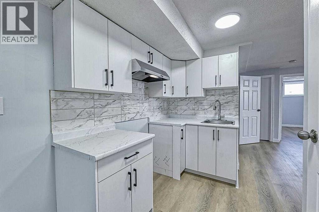 71 Falton Drive Ne, Calgary, Alberta  T3K 1K6 - Photo 39 - A2315489