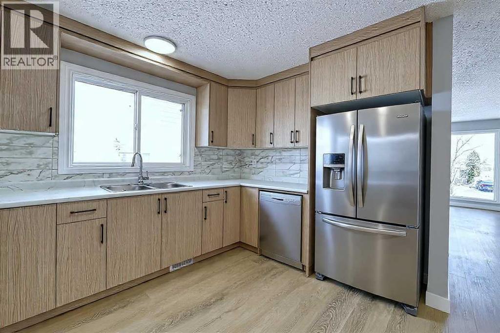 71 Falton Drive Ne, Calgary, Alberta  T3K 1K6 - Photo 14 - A2315489