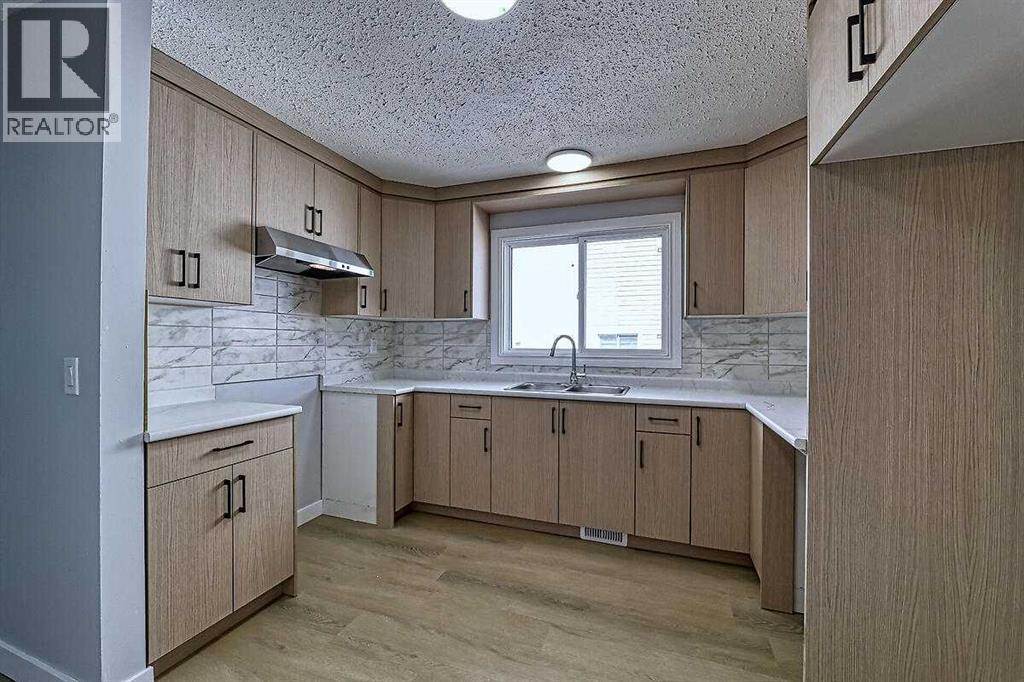 71 Falton Drive Ne, Calgary, Alberta  T3K 1K6 - Photo 12 - A2315489