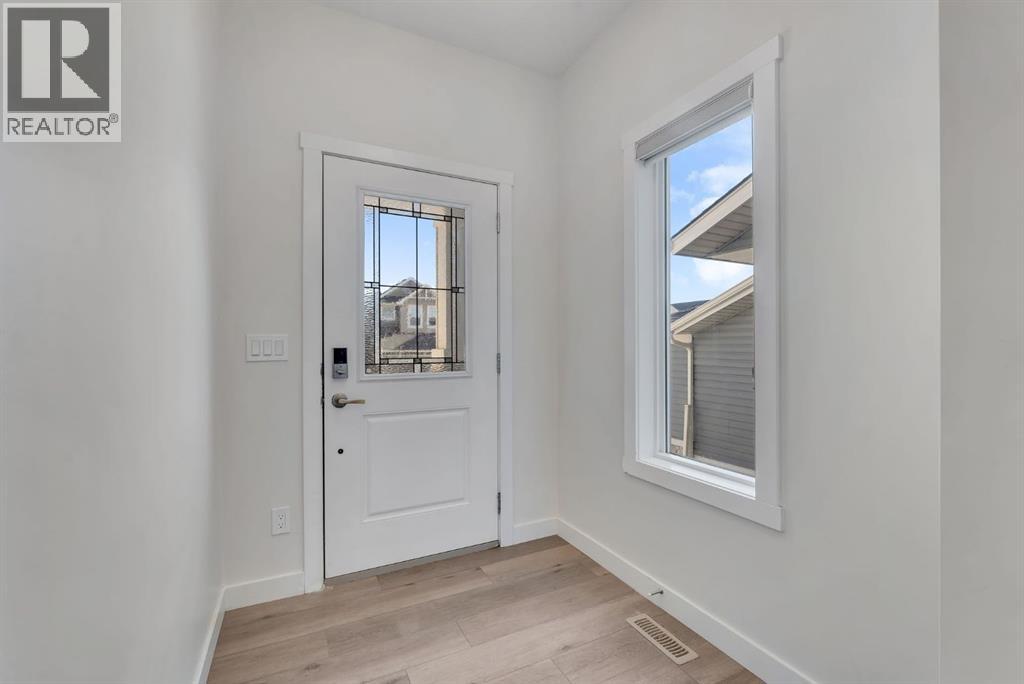 1489 Bayview Point SW, Airdrie, Alberta  T4B 5K1 - Photo 4 - A2325425