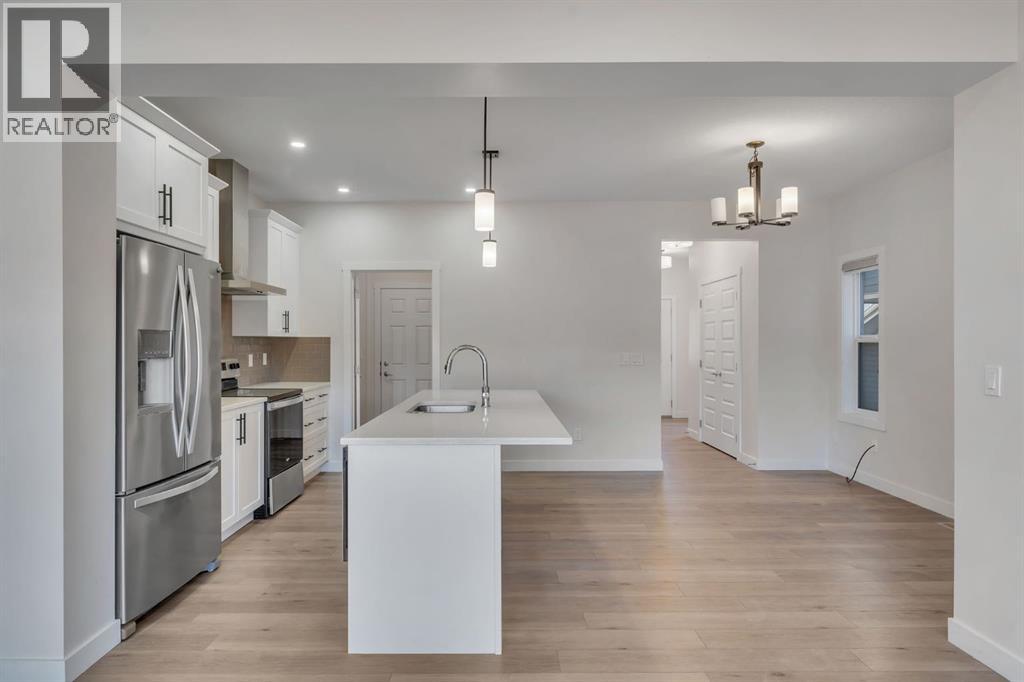 1489 Bayview Point SW, Airdrie, Alberta  T4B 5K1 - Photo 7 - A2325425