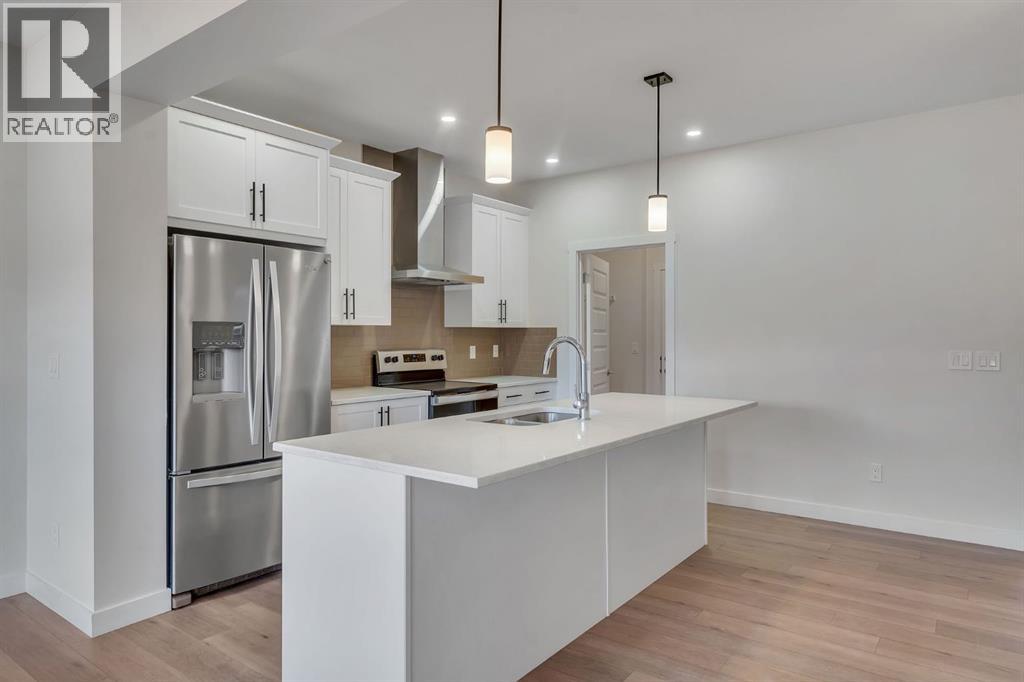 1489 Bayview Point SW, Airdrie, Alberta  T4B 5K1 - Photo 9 - A2325425