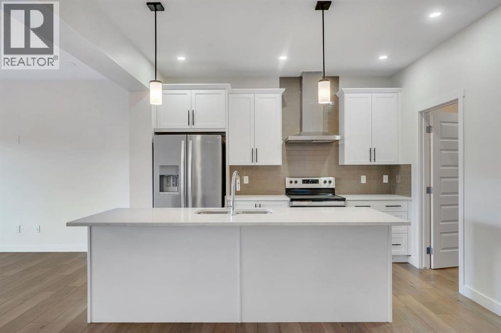 1489 Bayview Point SW, Airdrie, Alberta  T4B 5K1 - Photo 11 - A2325425