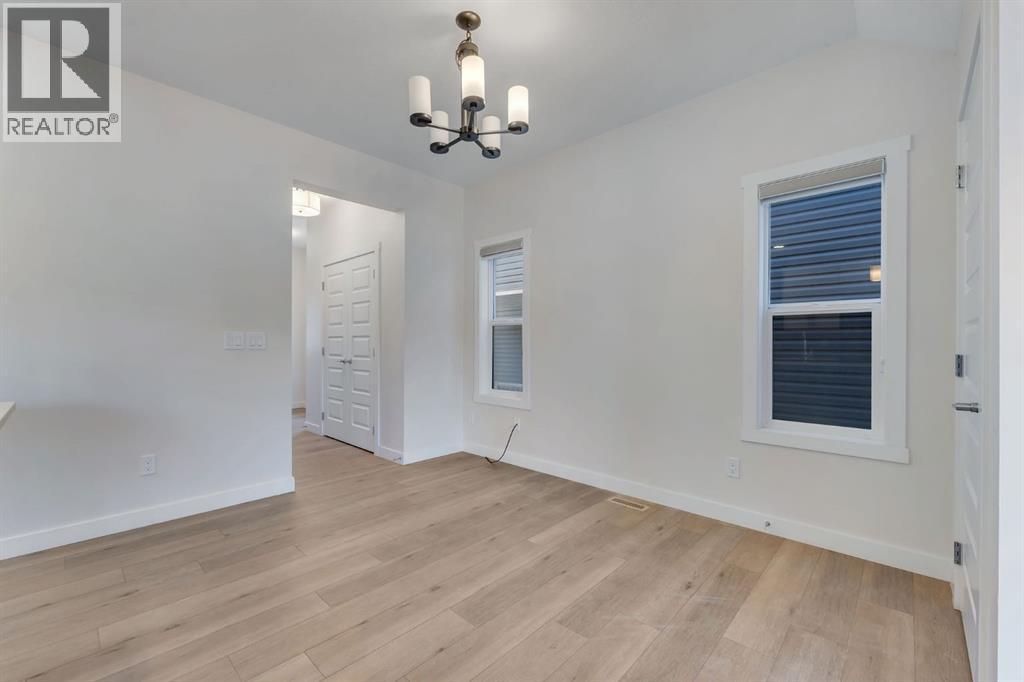 1489 Bayview Point SW, Airdrie, Alberta  T4B 5K1 - Photo 6 - A2325425