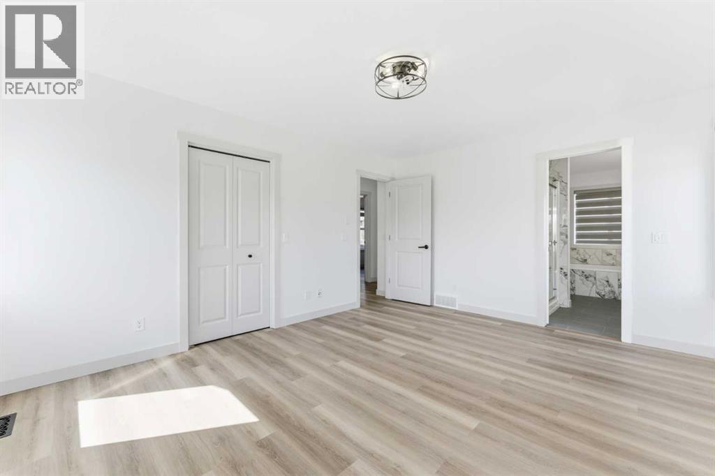 110 Tuscany Summit Green NW, Calgary, Alberta  T3L 0B8 - Photo 23 - A2315282
