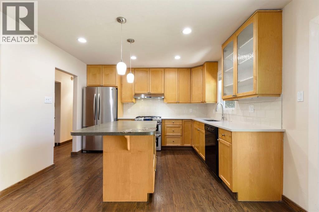 69 Winslow Crescent SW, Calgary, Alberta  T3C 2R3 - Photo 8 - A2326413