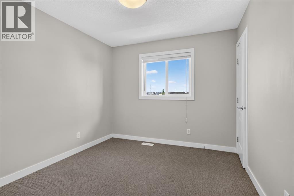 22 Panora Road NW, Calgary, Alberta  T3K 0R4 - Photo 30 - A2334301