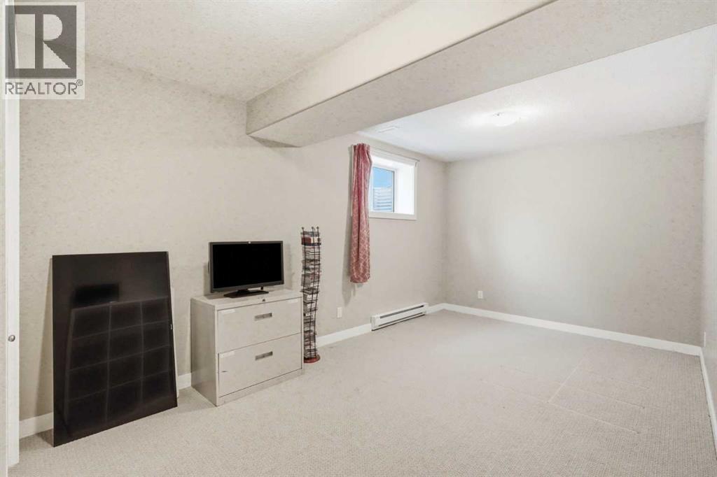242 Tusslewood Grove NW, Calgary, Alberta  T3L 2Y4 - Photo 26 - A2333386