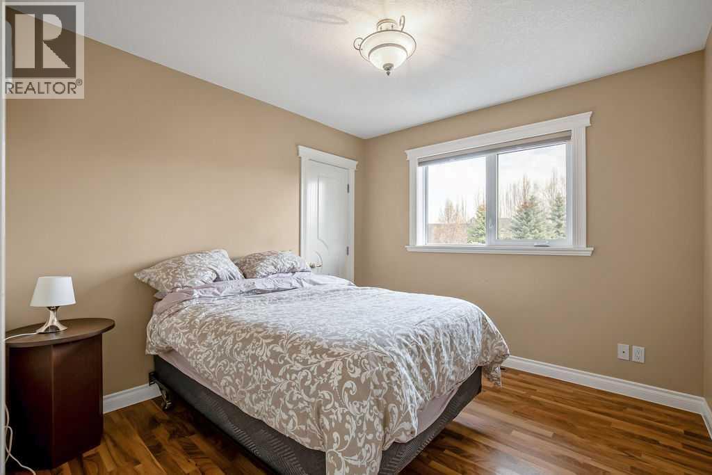 105 Lang Place, Okotoks, Alberta  T1S 1W8 - Photo 35 - A2334007