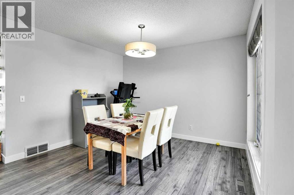 101 Douglas Ridge Circle SE, Calgary, Alberta  T2Z 3B7 - Photo 6 - A2334564