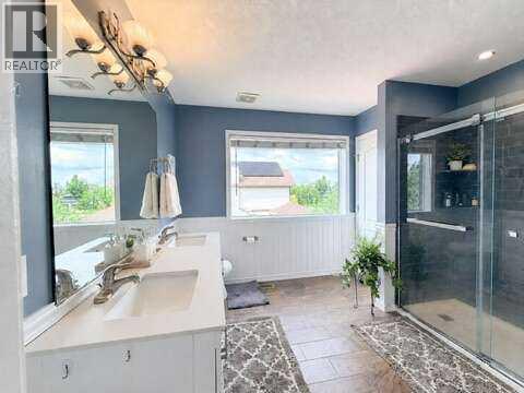 24 Brander Avenue NW, Langdon, Alberta  T0J 1X2 - Photo 17 - A2334594