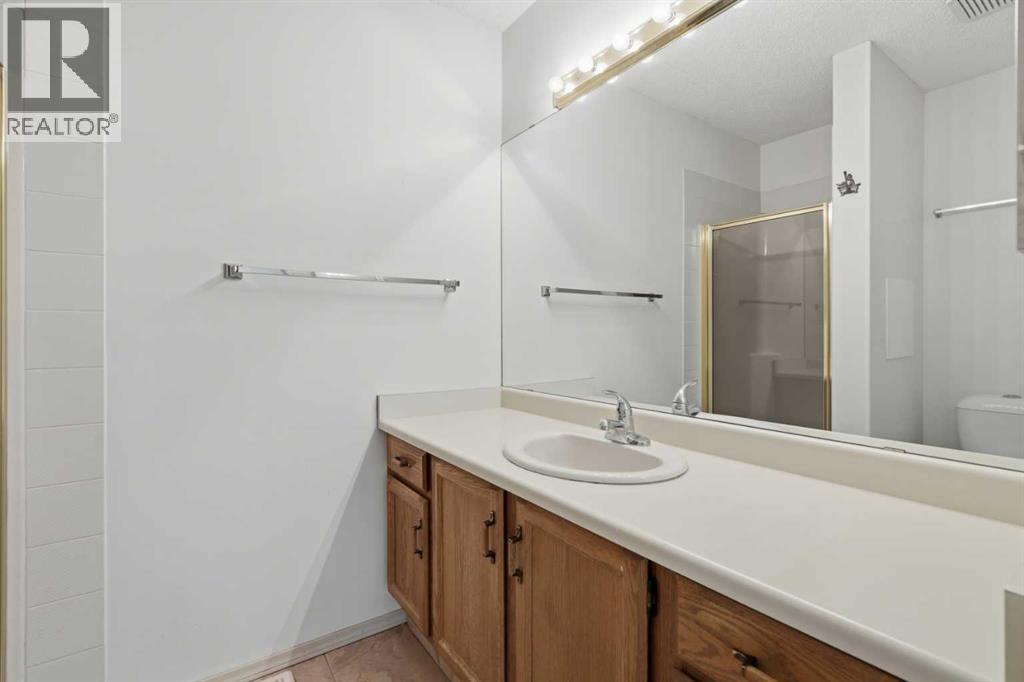 30 Sandarac Circle NW, Calgary, Alberta  T3K 3G7 - Photo 25 - A2334361
