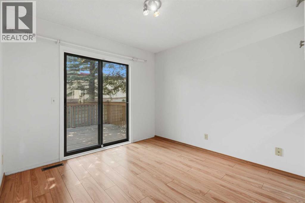 30 Sandarac Circle NW, Calgary, Alberta  T3K 3G7 - Photo 9 - A2334361