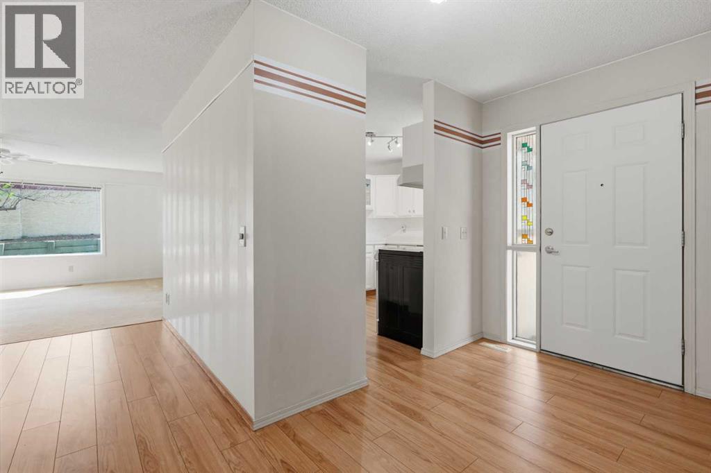 30 Sandarac Circle NW, Calgary, Alberta  T3K 3G7 - Photo 4 - A2334361