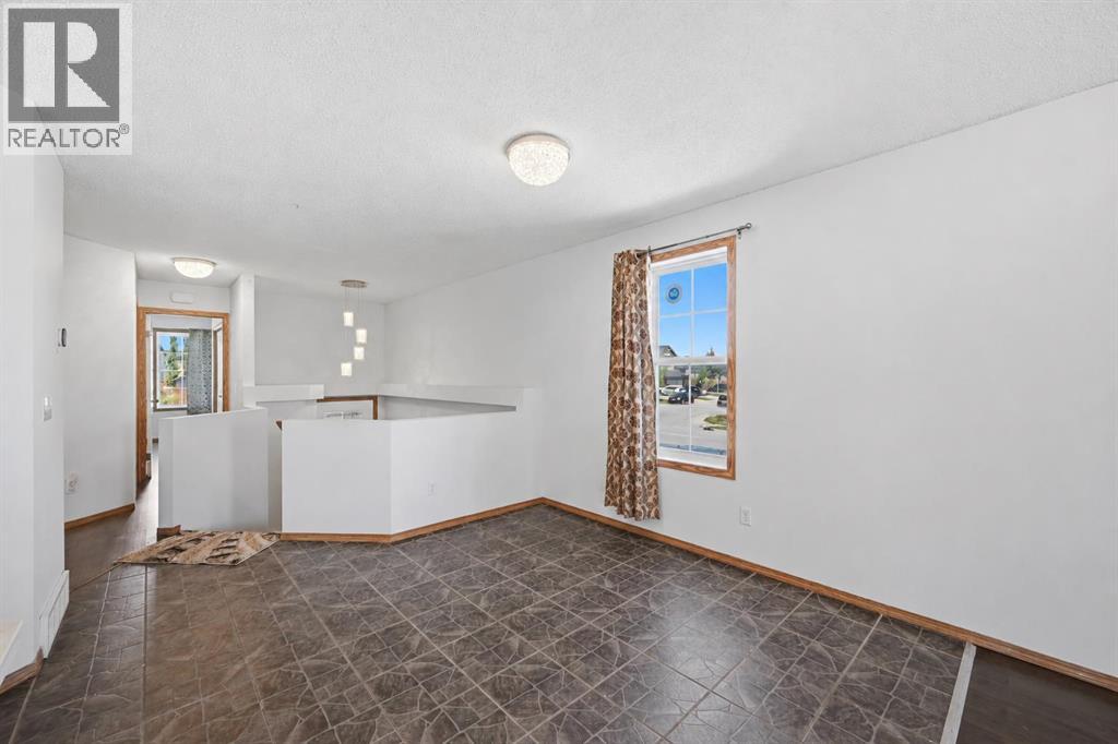 11 Covecreek Close NE, Calgary, Alberta  T3K 0J5 - Photo 6 - A2317659