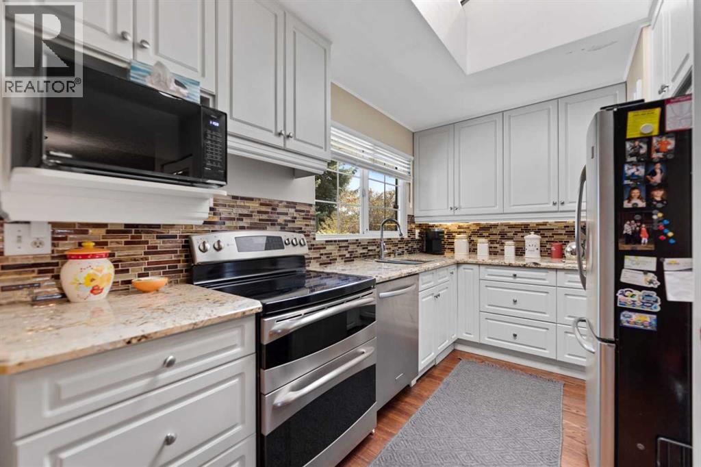 55 Kelvin Place SW, Calgary, Alberta  T2V 2L2 - Photo 14 - A2309252