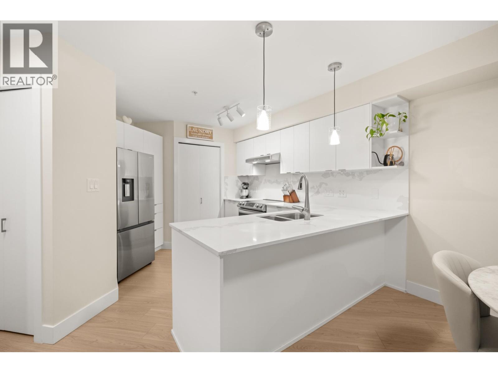 104 19673 Meadow Gardens Way, Pitt Meadows, British Columbia  V3Y 0A1 - Photo 7 - R3152047