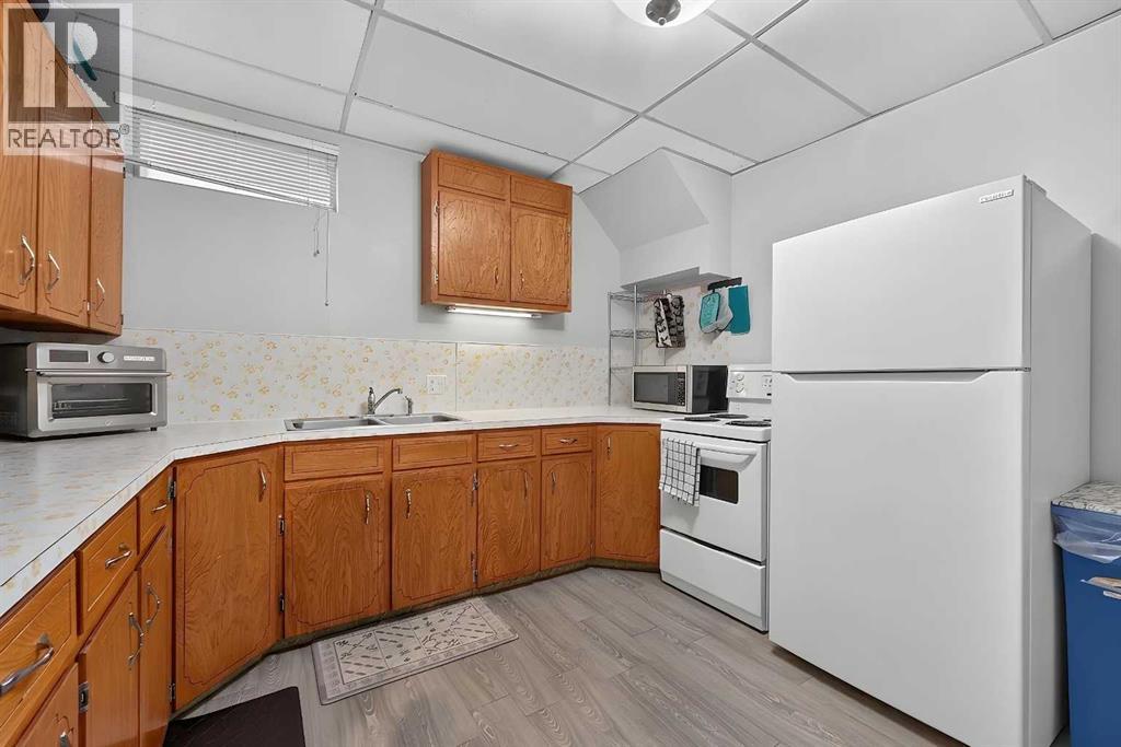 14 Rosetree Crescent NW, Calgary, Alberta  T2K 1M9 - Photo 39 - A2332942